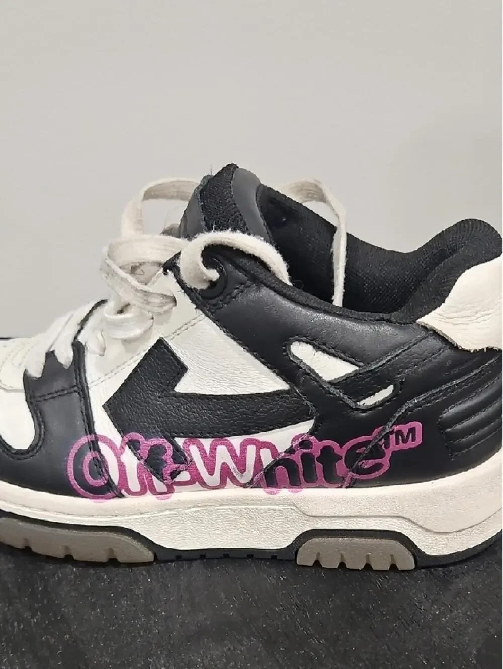 Black and White Low-Top Sneakers with Pink Accent
